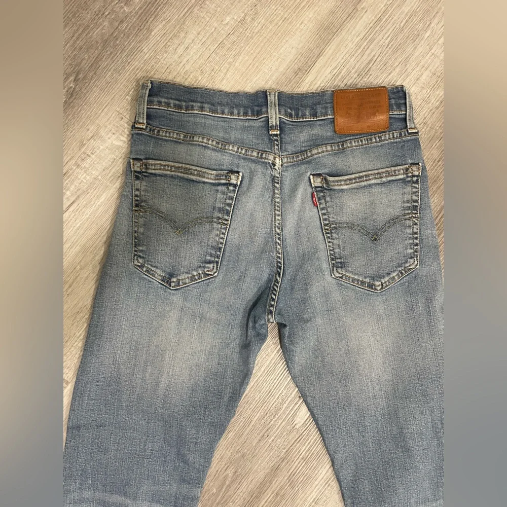 Levi's 502👖Men Premium Taper Fit Jeans with Vintage-Inspired Fading,size 31x32